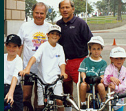 Steve with his children and Mayor Richard Riordan on a bike ride.