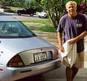 A candidate who drives, and washes, his electric car.