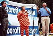 Fernando Award winner Lee Alpert, community activist "Sweet" Alice Harris, and Steve Soboroff on stage at the rally.