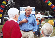 Steve speaks with two of the rally's attendees.